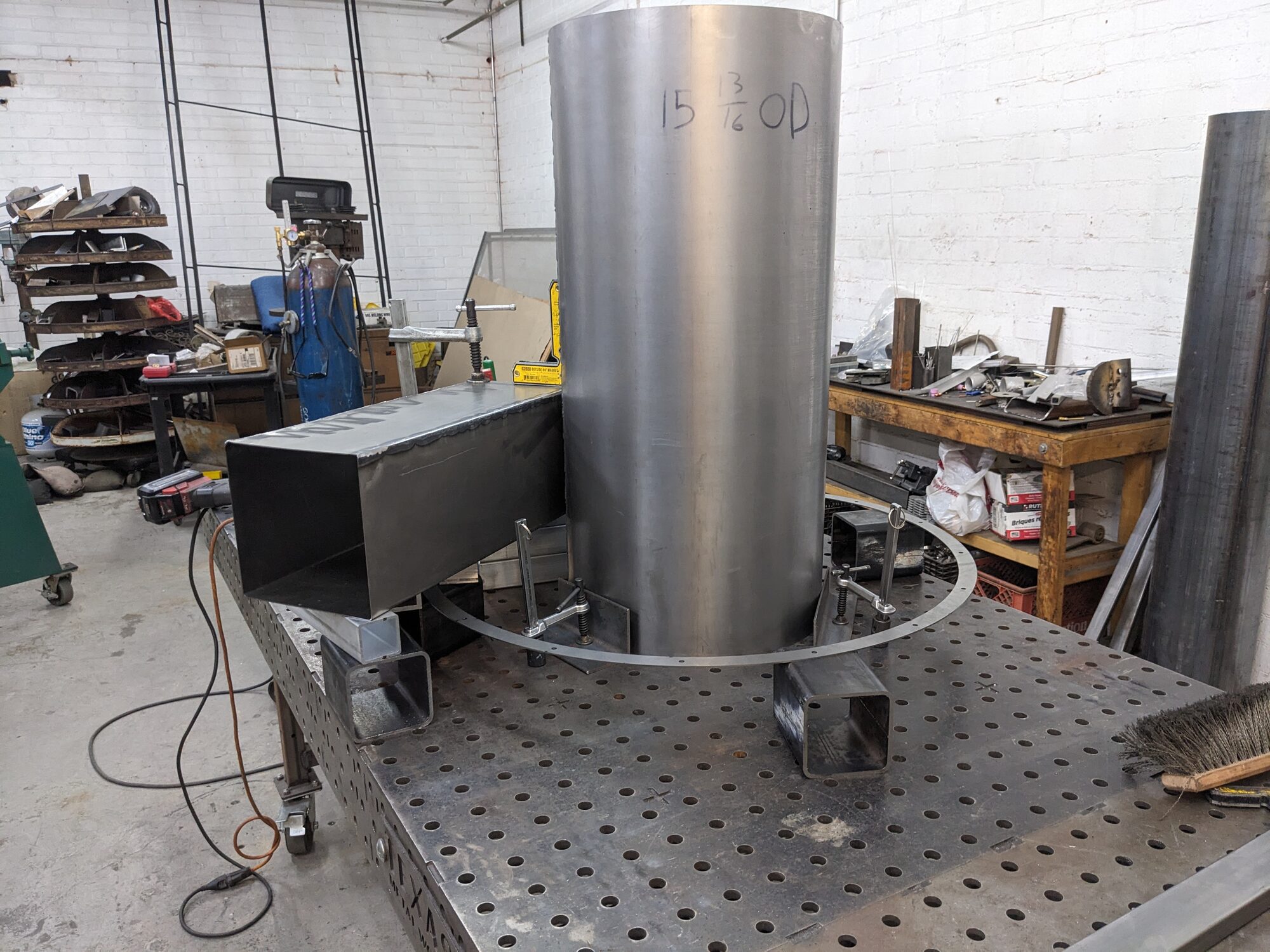 Rolled barrel with square inlet duct on the welding table