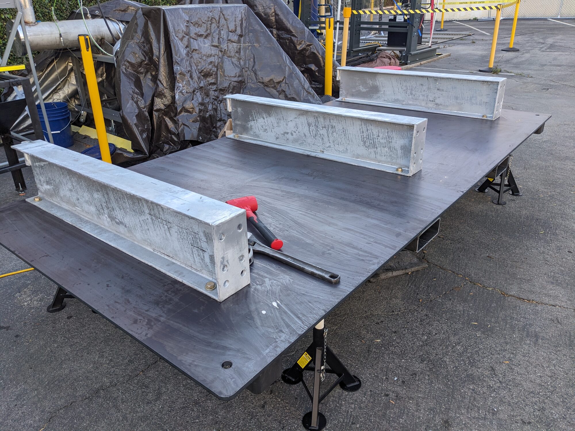 Base rails clamped for welding