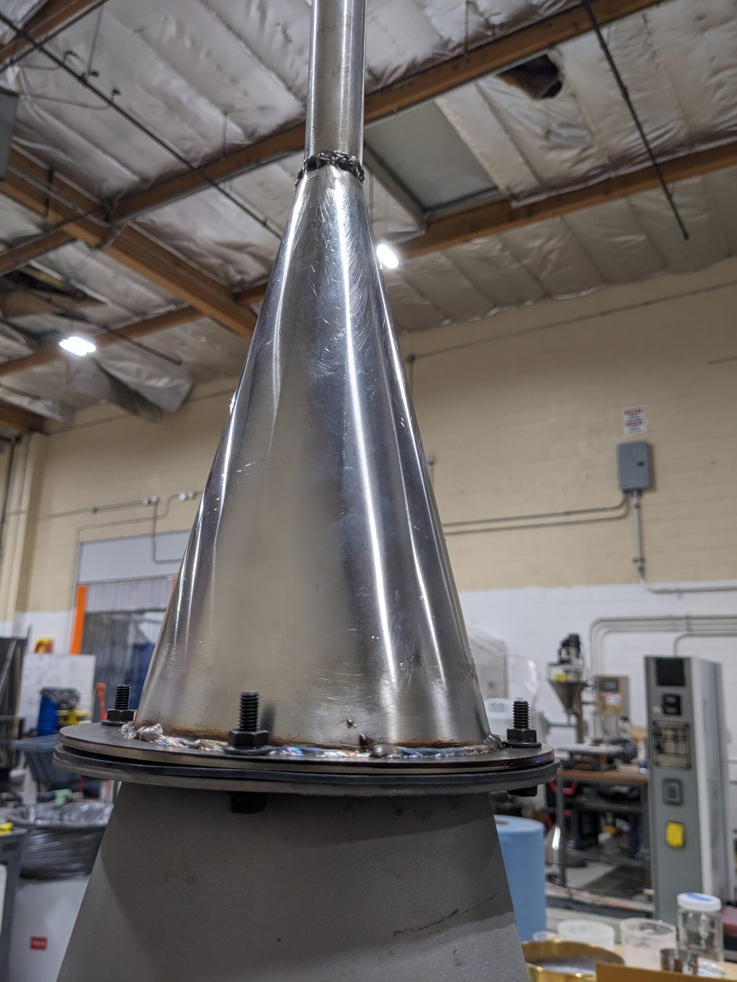 Close-up of the cyclone cone and mounting flange