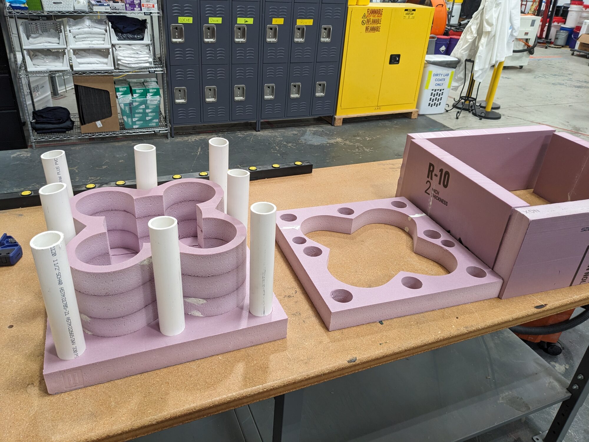 Foam core with PVC pipe stubs, lid cut alongside