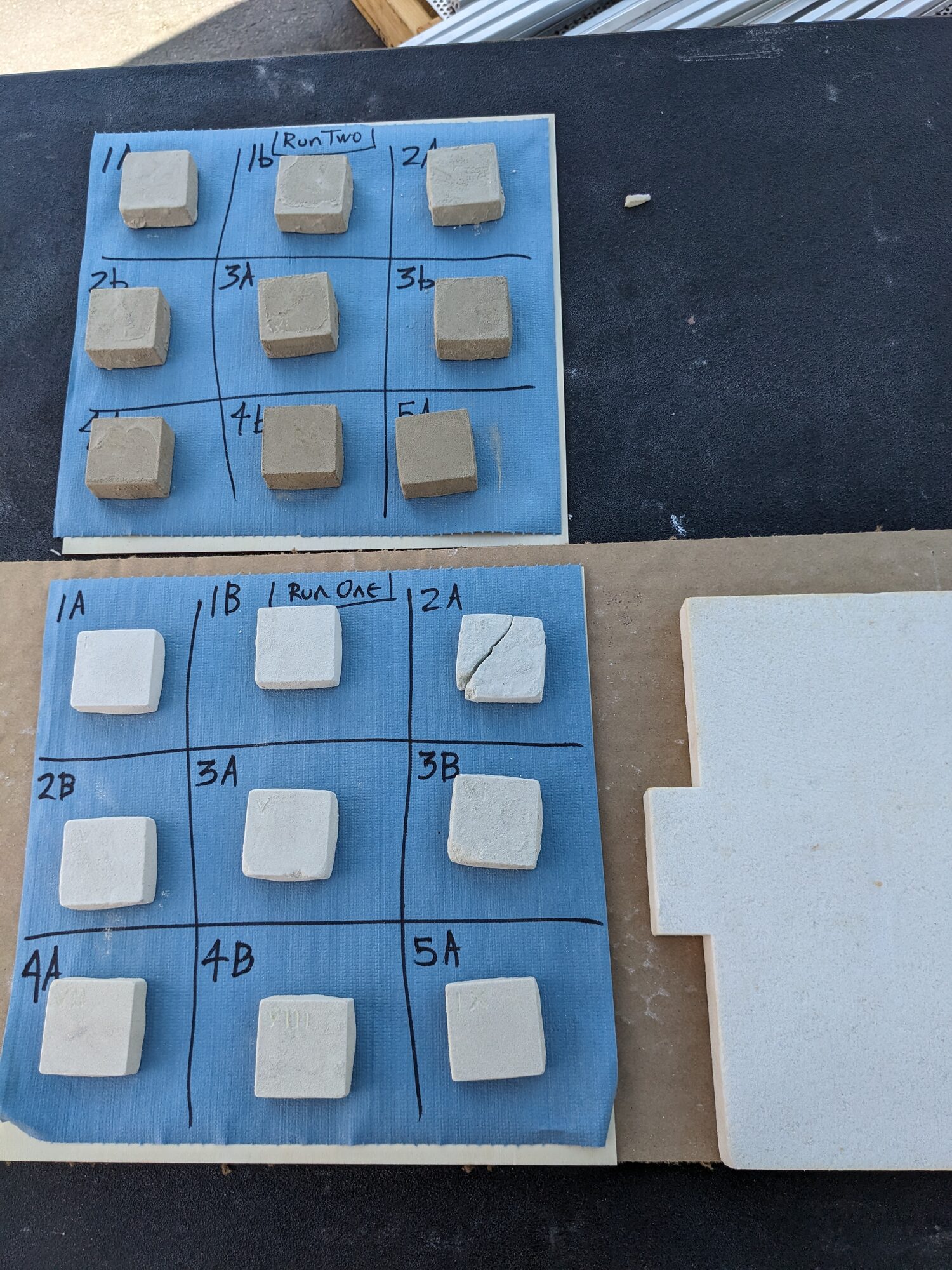 Both grids outdoors on the bench