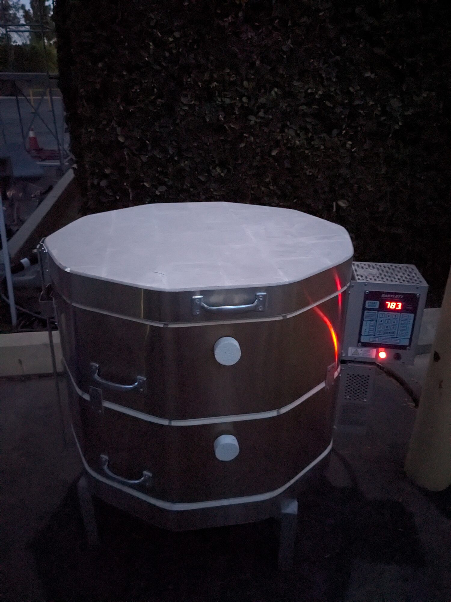 Kiln running at dusk with the controller reading 783
